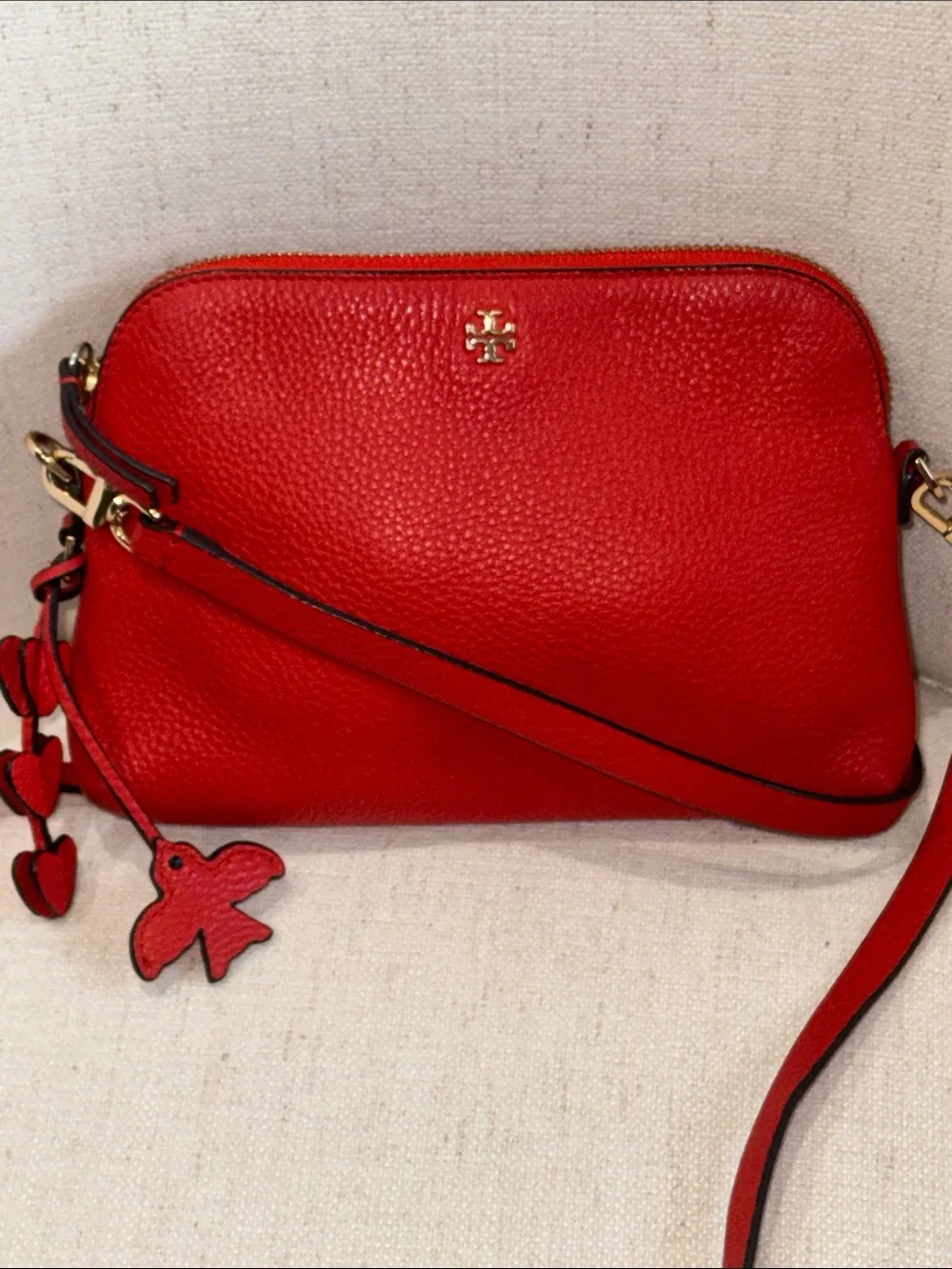 Tory Burch Red-Orange Pebbled Leather Crossbody with Heart Tassel